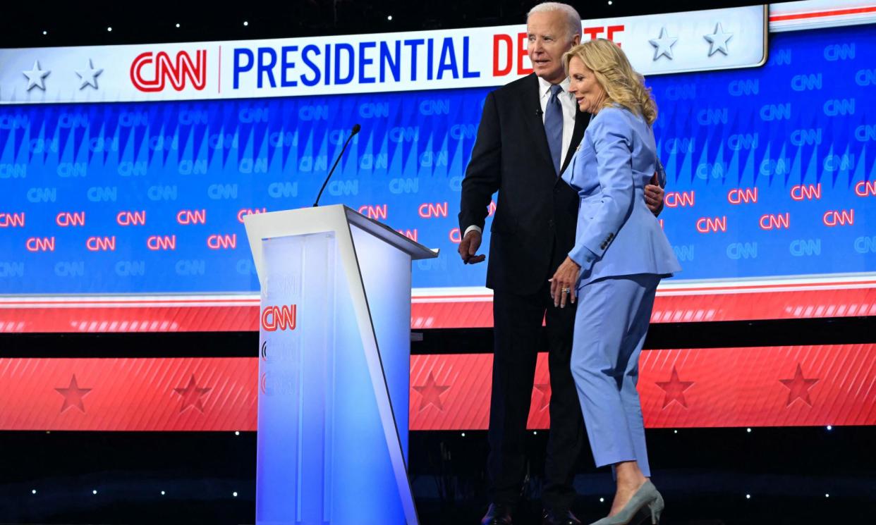 <span>Jill Biden joins Joe Biden on stage at the end of the first presidential debate of the 2024 elections.</span><span>Photograph: Andrew Caballero-Reynolds/AFP/Getty Images</span>