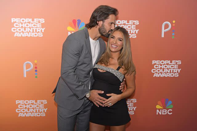 <p>Allen Clark/NBC via Getty</p> Eric Decker and Jessie James Decker at 2023 People's Choice Country Awards