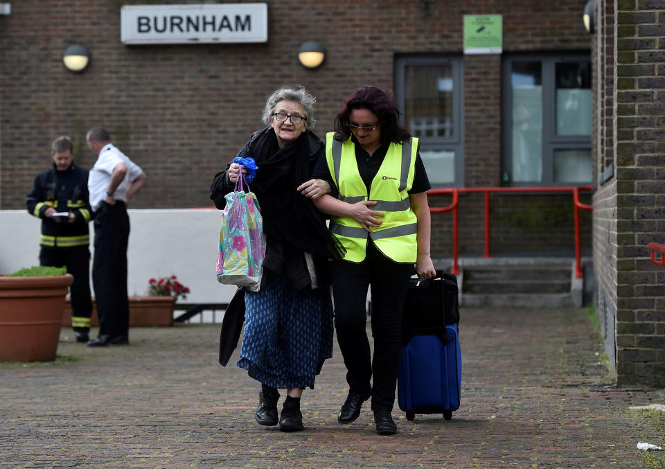 A resident is evacuated from the Burnham Tower