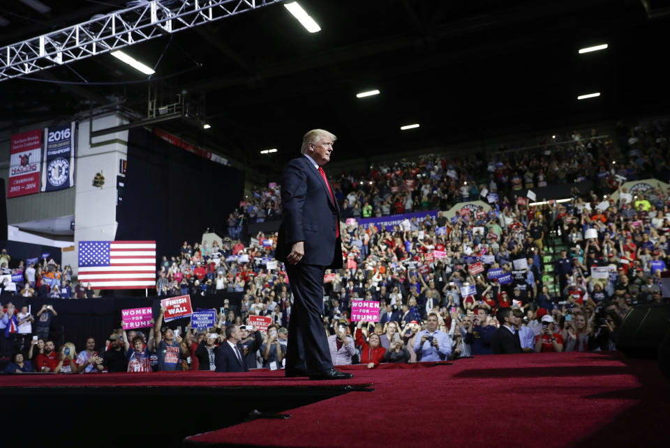 President Donald Trump walks towards the podium to begin to speak at a campaign rally at WesBanco Arena, Saturday, Sept. 29, 2018, in Wheeling, W.Va. (AP Photo/Pablo Martinez Monsivais)