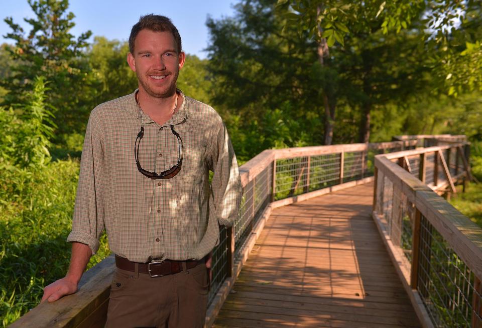 Sam Parrott is the new executive director of the Spartanburg Area Conservancy (SPACE). A native of Spartanburg, Parrott is a graduate of Spartanburg Day School and Wofford College, where he majored in Environmental Studies. Parrott talks about his new role with SPACE while walking along the Cottonwood Trail in Spartanburg, Wednesday, August 10, 2022. 