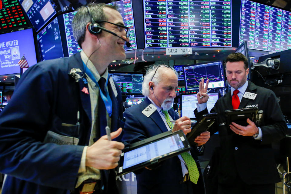 Traders work on the floor of the New York Stock Exchange (NYSE) in New York, U.S., December 27, 2018. REUTERS/Eduardo Munoz