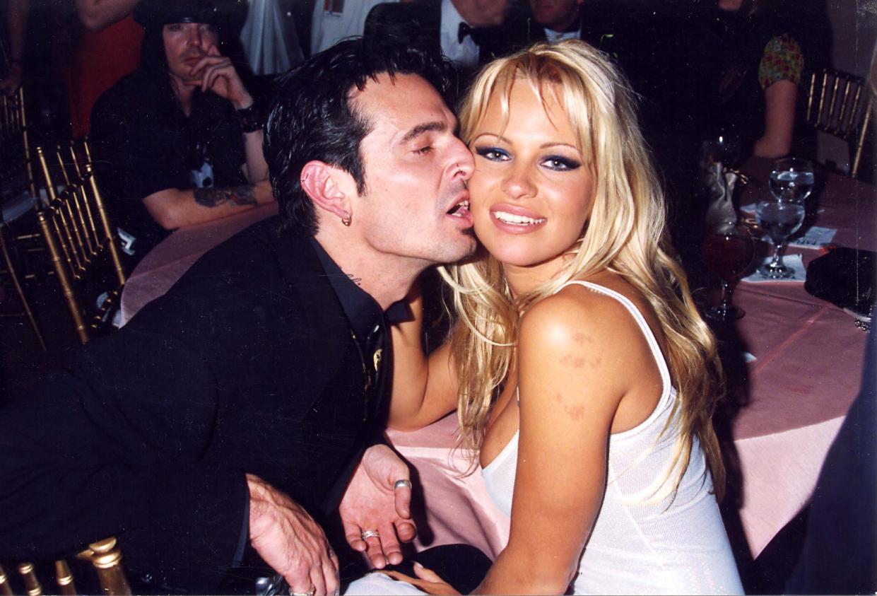 Tommy Lee and Pamela Anderson during 1995 GRAMMY Awards - A&M Party in Los Angeles, California, United States. (Photo by Jeff Kravitz/FilmMagic, Inc)