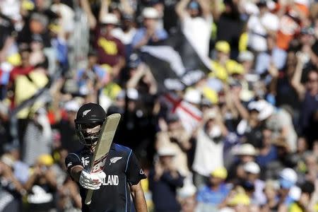 New Zealand's Grant Elliott reacts after reaching fifty runs during the Cricket World Cup final match against Australia at the Melbourne Cricket Ground (MCG) March 29, 2015. REUTERS/Hamish Blair