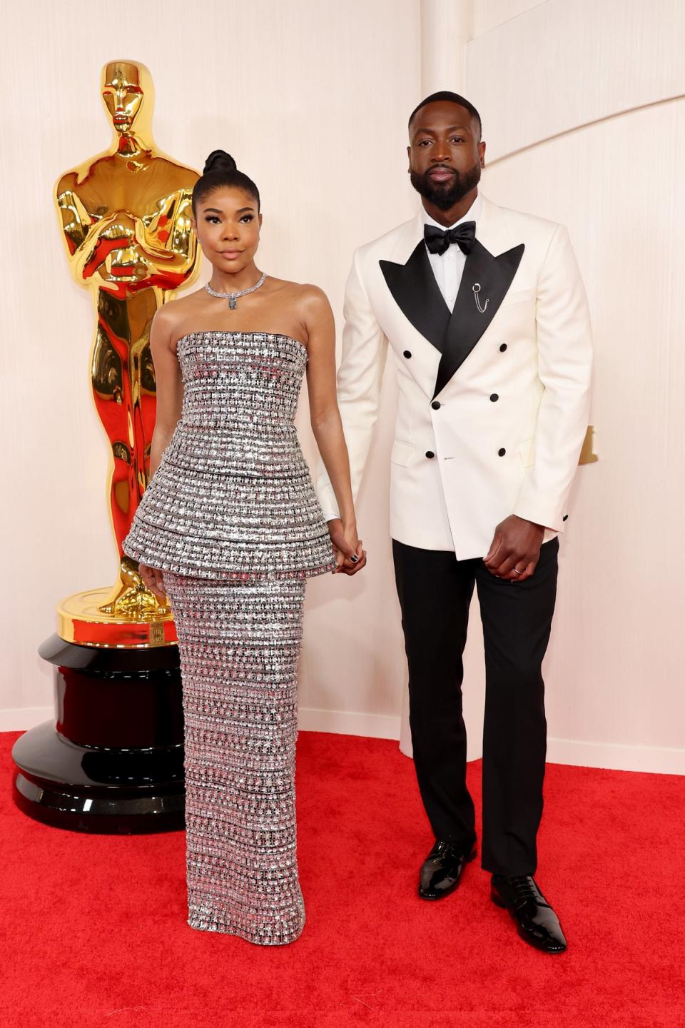Gabrielle Union in Carolina Herrera and Dwyane Wade in Atelier Versace (Getty Images)