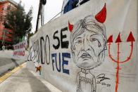 Demonstrators participate in a protest in La Paz