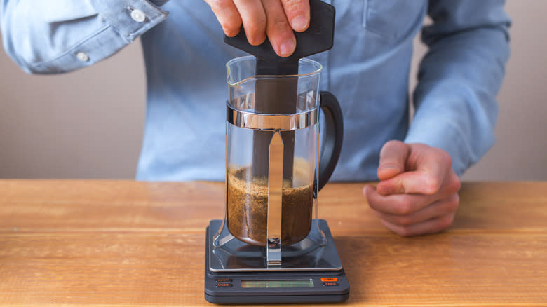 stirring coffee in french press