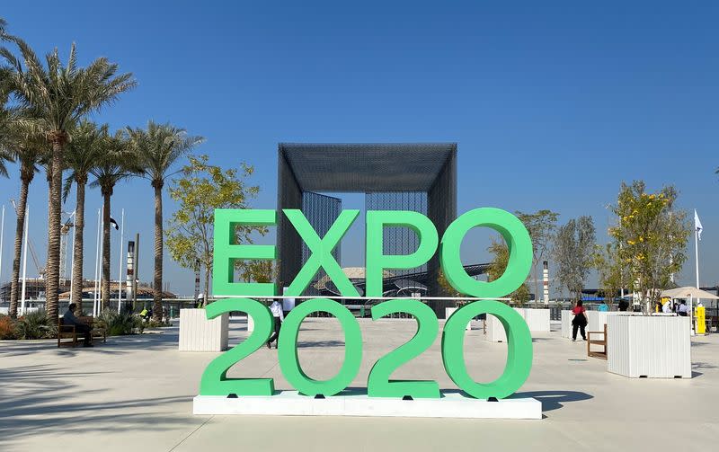 The sign of Dubai Expo 2020 is seen at the entrance of the site in Dubai