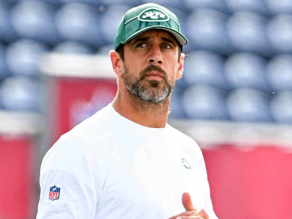 <p>Nick Cammett/Getty</p> Aaron Rodgers prior to the 2023 Pro Hall of Fame Game against the Cleveland Browns at Tom Benson Hall Of Fame Stadium on August 3, 2023 in Canton, Ohio. 