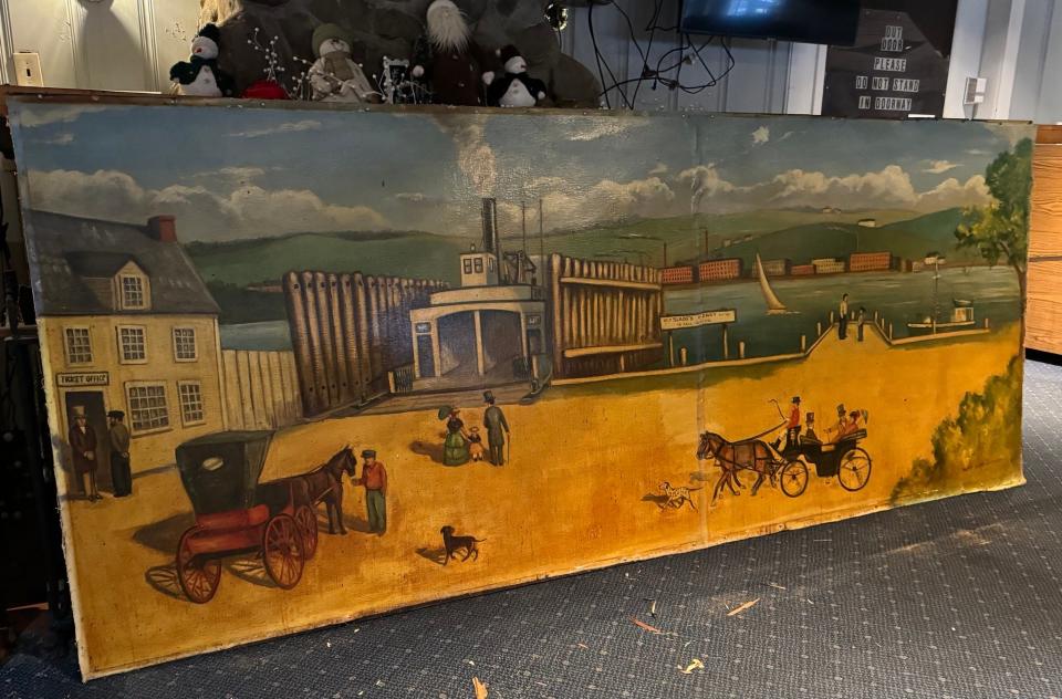 This mural, depicting the early days of Slade's Ferry Landing, was displayed for decades in the lounge area of the now-closed Magoni's Ferry Landing in Somerset. It has now been donated to the Somerset Historical Society.