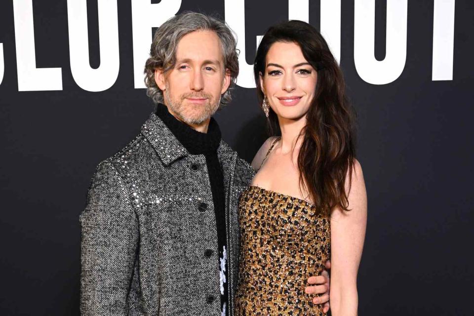 <p>Stephane Cardinale/Corbis via Getty</p> Anne Hathaway and Adam Shulman