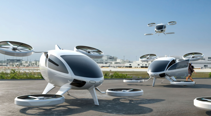 Fleet of Electric Vertical Take Off and Landing eVTOL Aircraft Used As Airport Shuttles 3d rendering, flying car stocks