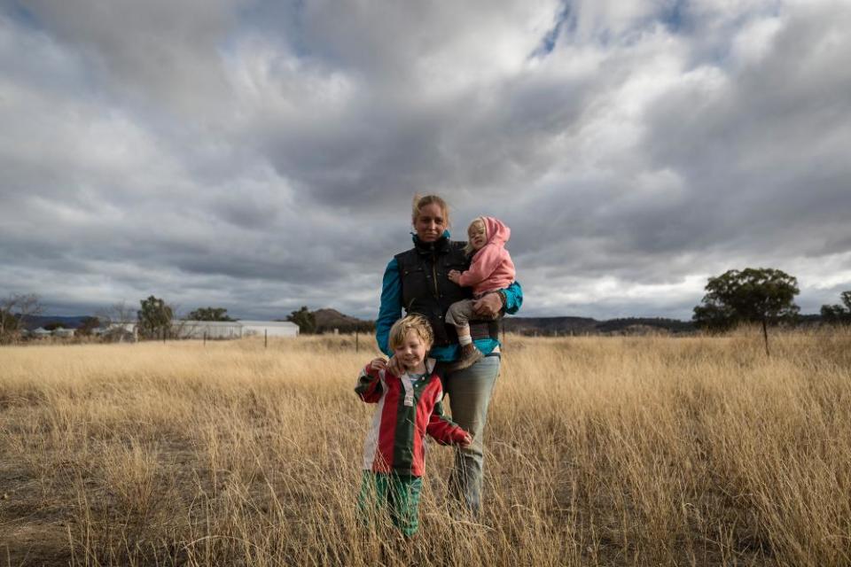 Mother Jessica Taylor, with Bony, 18 months, and Charlie,4, on their farm outside Coonabarabran.