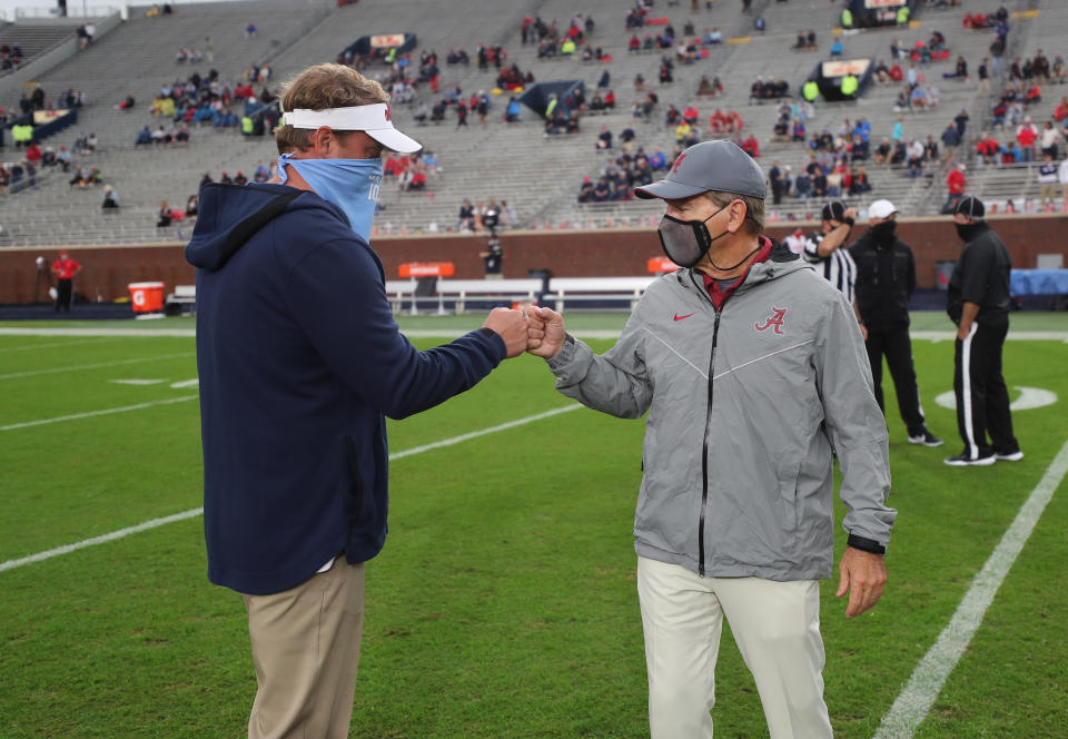 OXFORD, MS - OCTOBER 10: Head coach Nick Saban of the Alabama Crimson Tide meets head coach Lane Kiffin of the Ole Miss Rebels at Vaught Hemingway Stadium on October 10, 2020 in Oxford, Mississippi. (Photo by Kent Gidley/Collegiate Images/Getty Images)