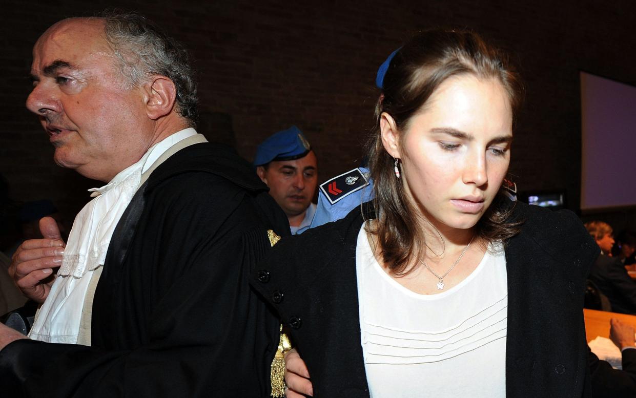 Public prosecutor Giuliano Mignini and Amanda Knox at her appeal hearing on Sep 26 2011 in Perugia - Getty Images Europe