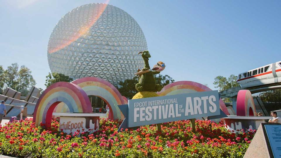Festival of the Arts garden in front of Spaceship Earth at Disney World's EPCOT.