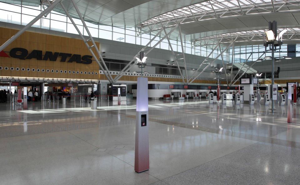 An almost deserted domestic terminal is seen at Sydney Airport.