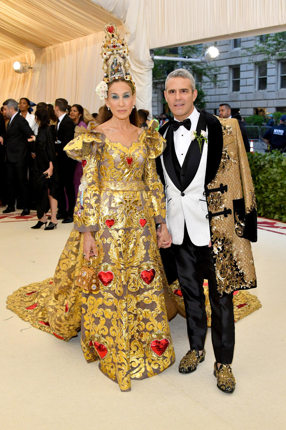 <p>Sarah Jessica Parker brought things to the next level in this Dolce & Gabbanna gold emroidered gown and towering headpiece. Photo: Getty Images </p>
