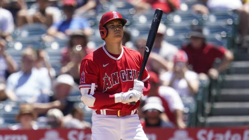 Los Angeles Angels' Shohei Ohtani prepares to bat during a baseball game against the Minnesota Twins Sunday, Aug. 14, 2022, in Anaheim, Calif. (AP Photo/Marcio Jose Sanchez)