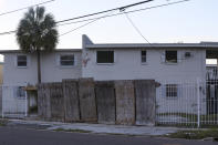 Damage to a fence in an area impacted by a local gerrymandering lawsuit in Jacksonville, Fla., is seen Jan. 30, 2023. A protracted legal fight over how city council districts were drawn in Jacksonville, Florida, reflects an aspect of redistricting that often remains in the shadows. Political map-drawing for congressional and state legislative seats captures wide attention after new census numbers are released every 10 years. No less fierce are the battles over the way voting lines are drawn in local governments, for city councils, county commissions and even school boards.(AP Photo/Gary McCullough)