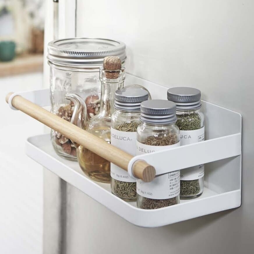 The magnetic rack holding jars of spices