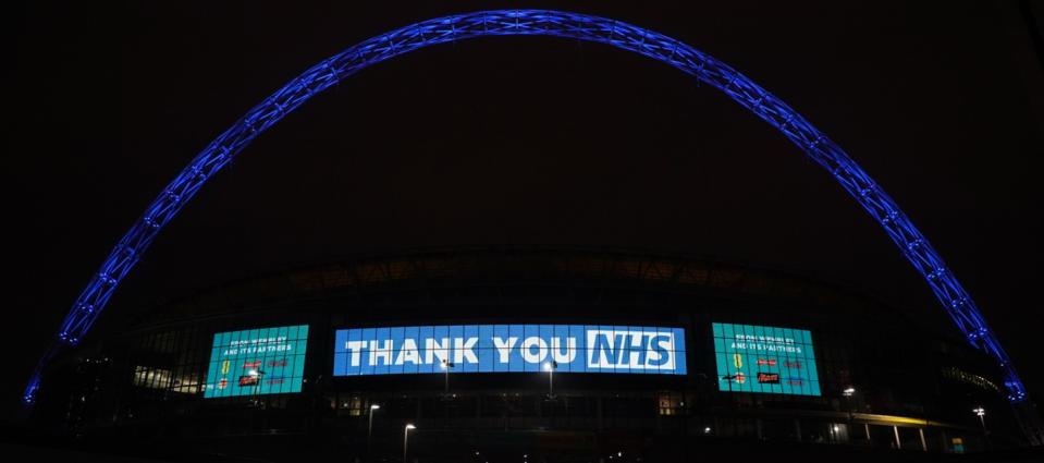 Wembley will be one of many UK landmarks turned blue at 8pm tonight to celebrate the heroes of the National Health Service  
