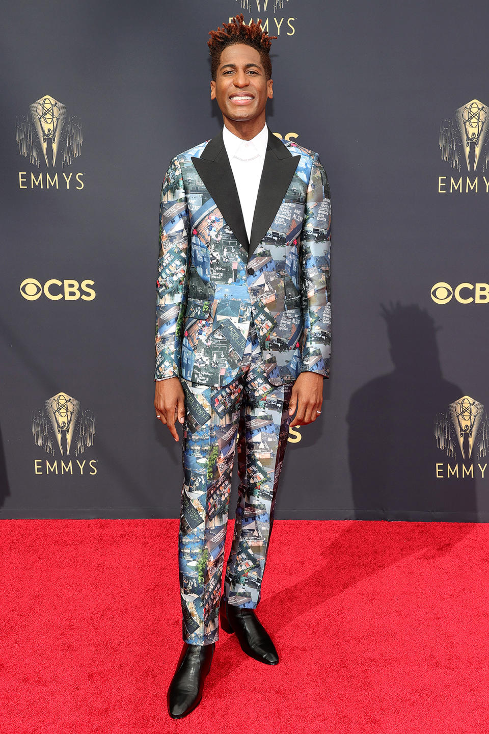 <p>Batiste made a statement with his tux, which was created from a fabric featuring photos of climate devastation.</p>