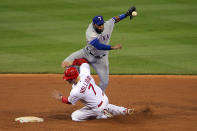 ST LOUIS, MO - OCTOBER 27: Matt Holliday #7 of the St. Louis Cardinals is out at second base by Elvis Andrus #1 of the Texas Rangers on a fielders choice in the fourth inning during Game Six of the MLB World Series at Busch Stadium on October 27, 2011 in St Louis, Missouri. (Photo by Doug Pensinger/Getty Images)