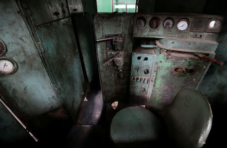 The driver's seat is seen inside an old locomotive used on the Karachi Circular Railway line, in the railway mechanical yard in Karachi, Pakistan, May 25, 2017. REUTERS/Caren Firouz
