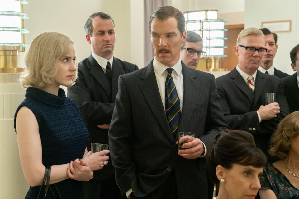 This image released by Roadside Attractions shows Rachel Brosnahan, left, and Benedict Cumberbatch, center, in a scene from "The Courier." (Liam Daniel/Roadside Attractions via AP)