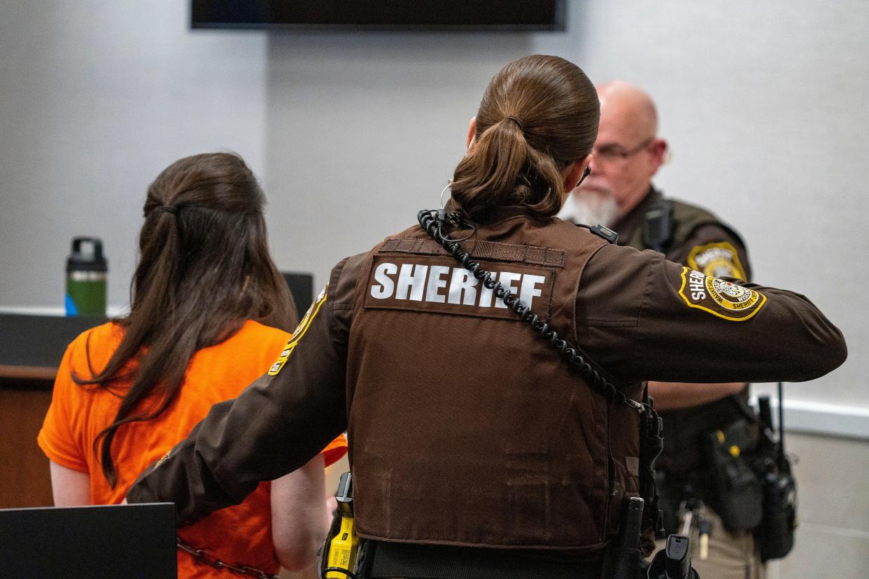 Jessy Kurczewski is taken by a Waukesha County Sheriff's deputy as Waukesha County Circuit Court Judge Jennifer Dorow reads her sentencing on Friday, April 5, 2024, at the Waukesha County Courthouse in Waukesha, Wis.