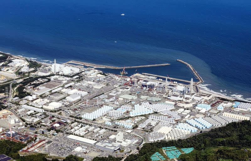 FILE PHOTO: An aerial view shows the tsunami-crippled Fukushima Daiichi nuclear power plant which started releasing treated radioactive water into the Pacific Ocean, in Okuma town