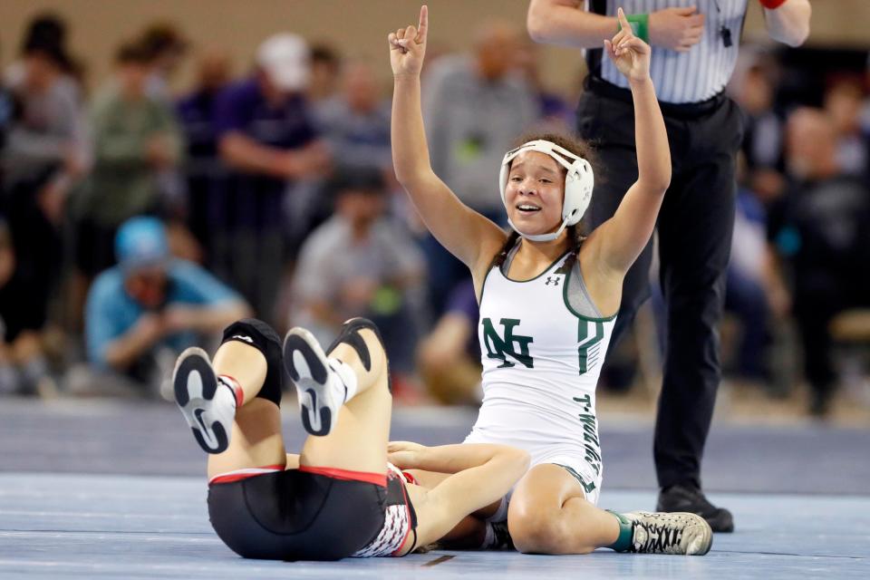 Norman North's Coty Sessions celebrates after beating Mariah Roberts in the girls Class 6A 110-pound match during the high school state wrestling tournament championships at State Fair Arena in Oklahoma City, Saturday, Feb. 24, 2024.