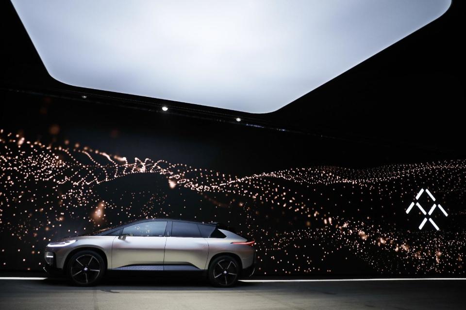 Faraday Future's FF 91 electric car is unveiled during a news conference at CES International Tuesday, Jan. 3, 2017, in Las Vegas. (AP Photo/Jae C. Hong)