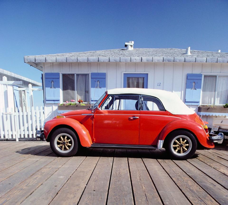 a red Volkswagon convertible