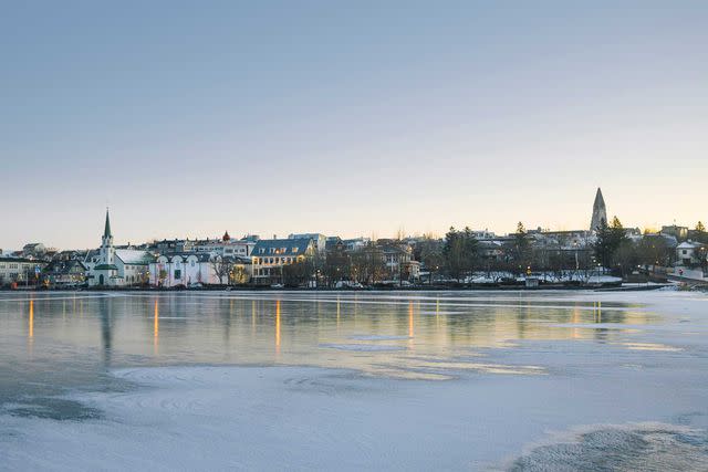 <p>Axel Sigurðarson</p> Winter light on Tjörnin, a lake in downtown Reykjavík.