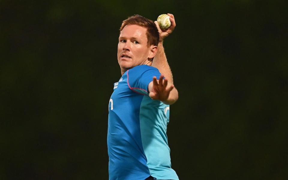 Eoin Morgan of England throws the ball during a fielding drill ahead of the ICC Men's T20 World Cup match between England and West Indies at ICC Academy on October 22, 2021 - GETTY IMAGES