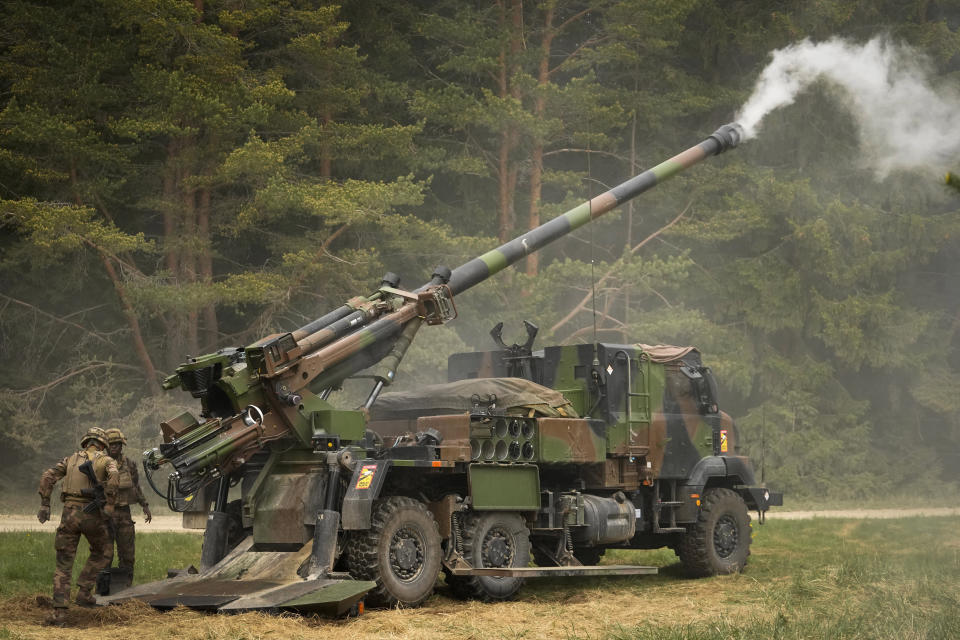 FILE - French soldiers fire a French-made CAESAR self-propelled howitzer during the Spring Storm 2023 military drills, the largest annual exercise of Estonian Defence Forces, near Tapa, Estonia on May 25, 2023. France on Thursday, Jan. 18, 2024, announced more planned deliveries of its Caesar artillery system to Ukraine and said it is speeding up weapons manufacturing as it seeks to avoid depleting its own military stocks while continuing to support Kyiv. (AP Photo/Sergei Grits, file)