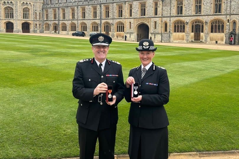 Chief Fire Officer Phil Garrigan, who received the King's Fire Service Medal with Chief Constable Serena Kennedy