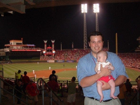 Joe Katuska balances life on the road as the Cincinnati Reds scouting director with being a father of four.