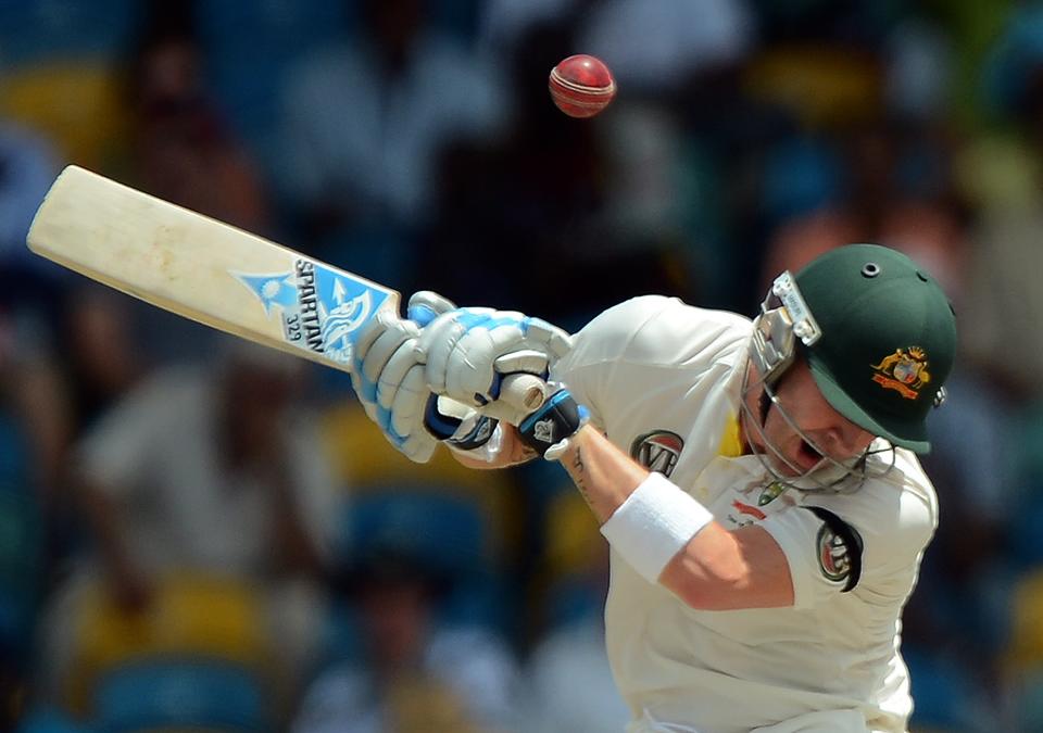 Australian cricket team captain Michael Clarke ducks to avoid a bouncer during the third day of the first-of-three Test matches between Australia and West Indies at the Kensington Oval stadium in Bridgetown on April 9, 2012. West Indies scored of 449/9 at the end of their first innings. AFP PHOTO/Jewel Samad (Photo credit should read JEWEL SAMAD/AFP/Getty Images)