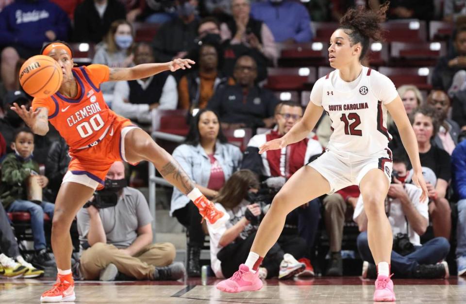 Clemson’s Delicia Washington (00) snags a pass as South Carolina’s Brea Beal (12) looks on during the first half of action on Wednesday, Nov. 17, 2021 in the Colonial Life Arena.