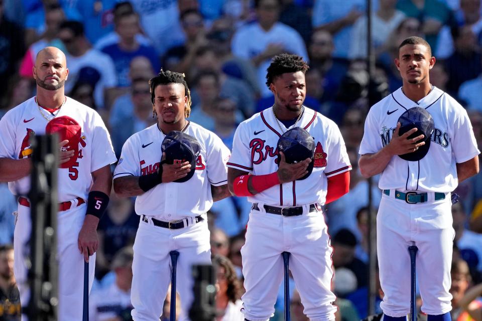 Albert Pujols, Jose Ramirez, Ronald Acuña Jr. and Julio Rodriguez prior to Monday's Home Run Derby.