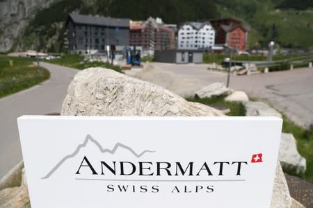 A sign is seen in front of the Andermatt Swiss Alps resort in Andermatt