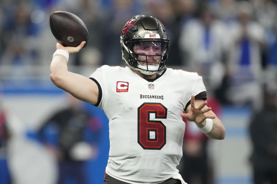 Tampa Bay Buccaneers quarterback Baker Mayfield throws a pass against the Detroit Lions during the first half of an NFL football NFC divisional playoff game, Sunday, Jan. 21, 2024, in Detroit. (AP Photo/Paul Sancya)
