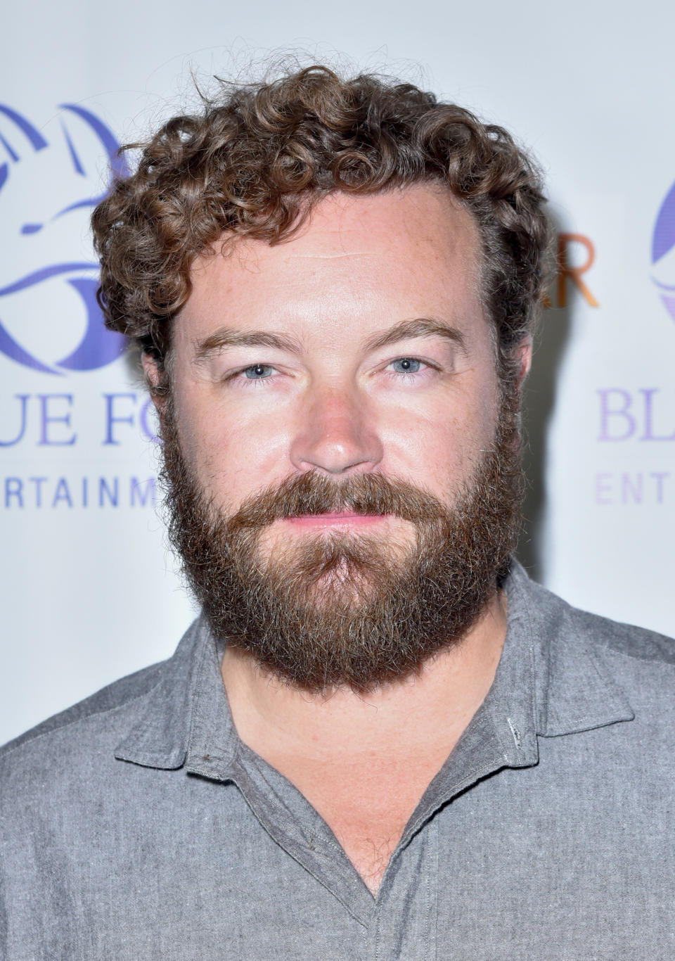 Danny Masterson poses at an event in 2019