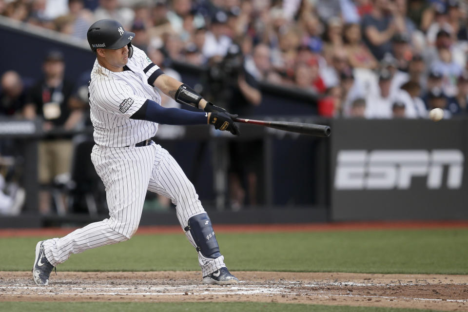 New York Yankees' Gary Sanchez hits a two-RBI single against the Boston Red Sox during the seventh inning of a baseball game in London, Sunday, June 30, 2019. (AP Photo/Tim Ireland)