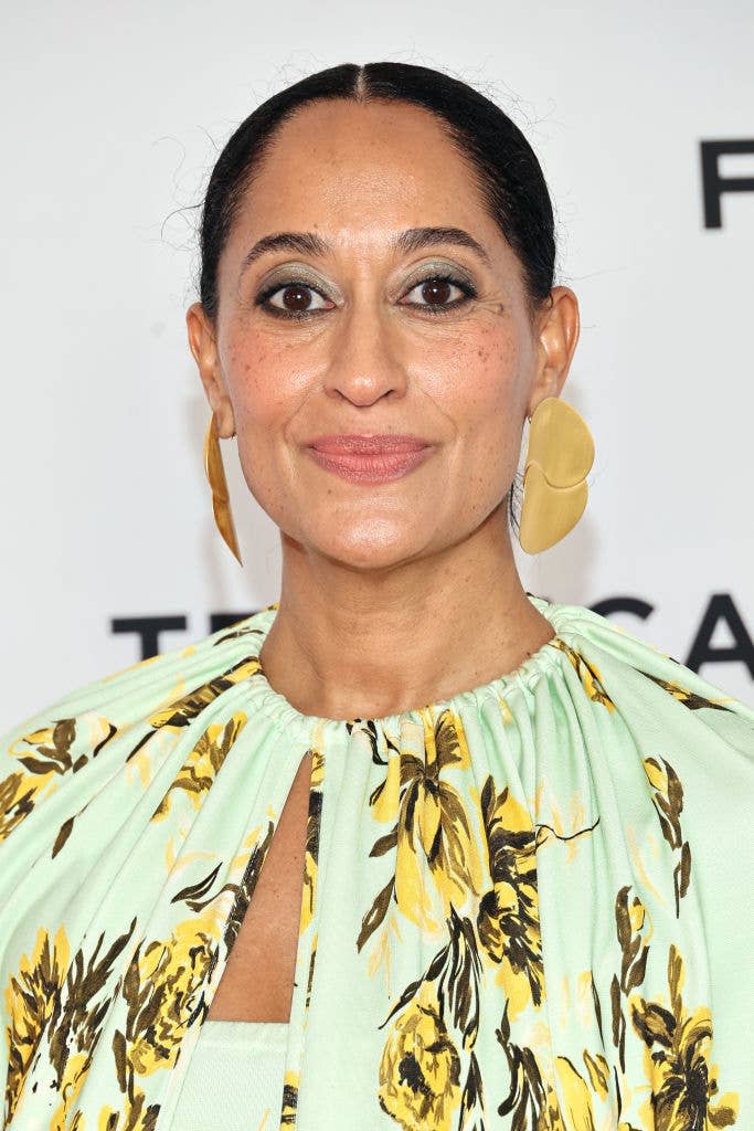 Closeup of Tracee Ellis Ross wearing large drop earrings