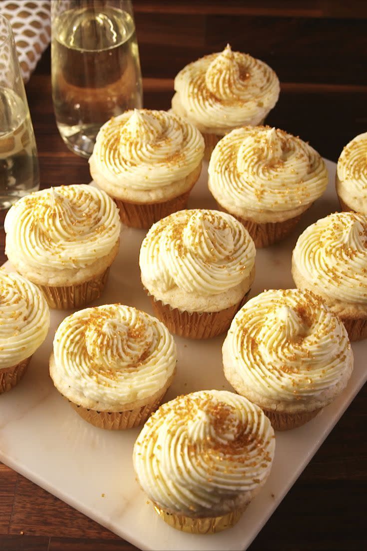 <p>A must make for New Year's Eve. </p><p>Get the <a href="https://www.delish.com/uk/cooking/recipes/a28795847/champagne-cupcakes-recipe/" rel="nofollow noopener" target="_blank" data-ylk="slk:Champagne Cupcakes;elm:context_link;itc:0;sec:content-canvas" class="link ">Champagne Cupcakes</a> recipe.</p>