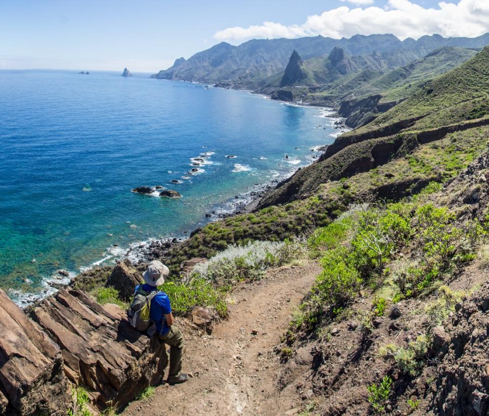 Hiker on a coastal trail on Tenerife.